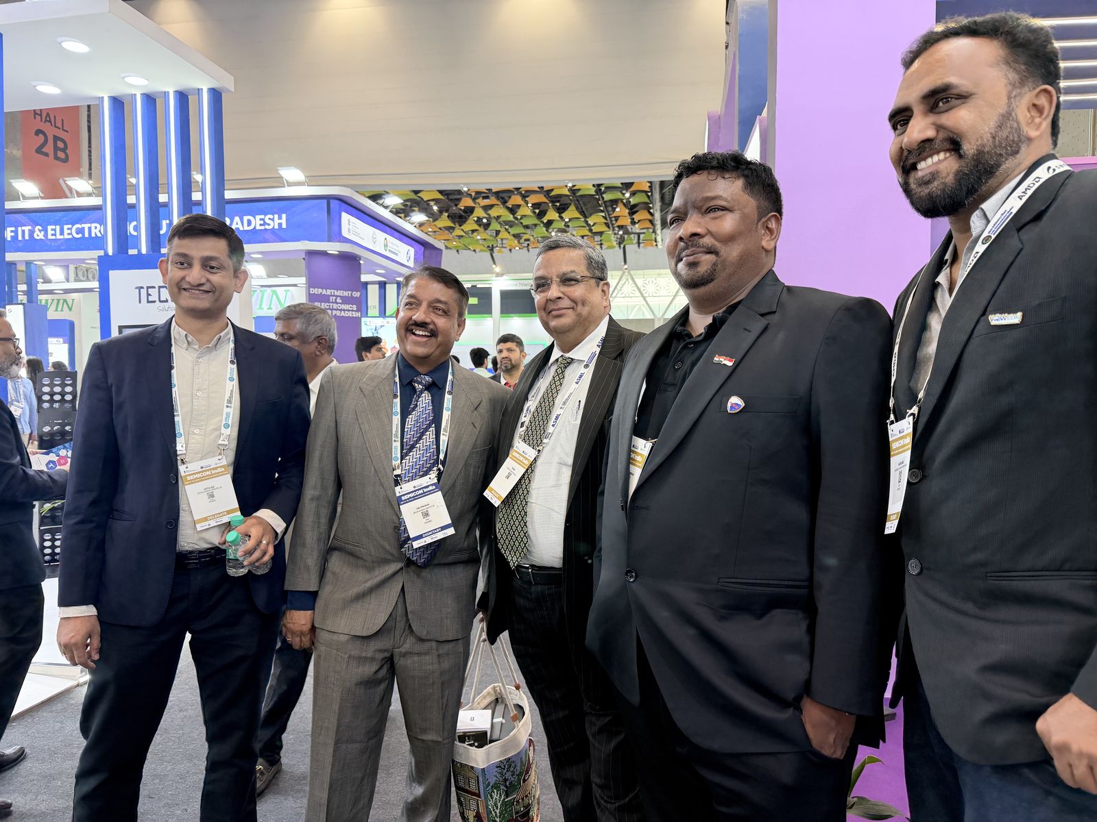 Venkatesh Kumar Pandurengan in conversation with peers at a SEMICON India booth